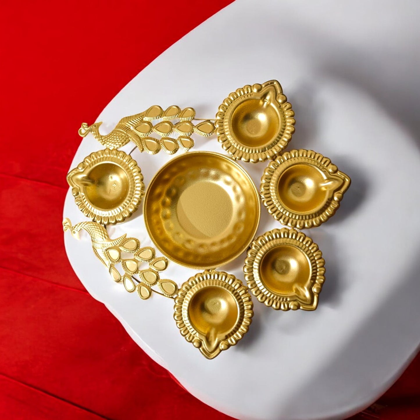 Gold Metal Decorative Diya Thali Set with 5 tealight holders and a center plate with a peacock design for home decor