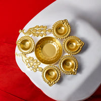 Gold Metal Decorative Diya Thali Set with 5 tealight holders and a center plate with a peacock design for home decor